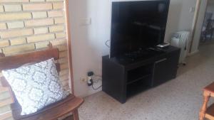 apartamento playa de Levante,parking, aire dos habitaciones y dos baños vistas playa y jardin