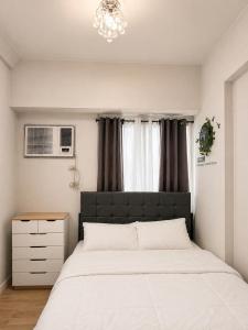 Cozy Alabang Condo with Pool and Near Malls & Airport