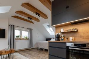 Apartmán nad Bednářstvím s dřevěnou vířivou vanou