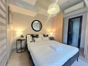Elegant Central 1BR BGC Uptown Parksuites T2
