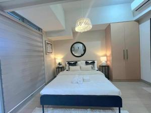 Elegant Central 1BR BGC Uptown Parksuites T2