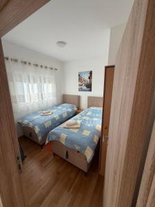 Seafront Serenity - 2BR Beach Walk Apartment