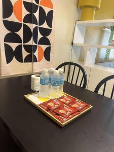 NAIA Stay 1BR One Palm Tree Villas Newport Balcony