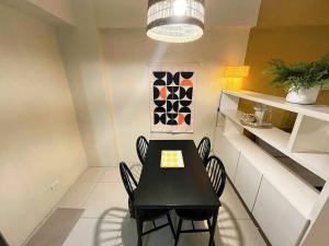 NAIA Stay 1BR One Palm Tree Villas Newport Balcony