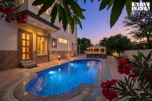 StayVista at The Farm 15 with Pool & Lawn