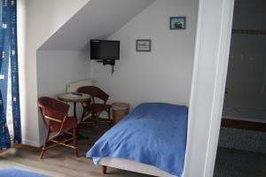 Hotels Aux Trois Jean : photos des chambres