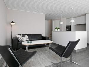 8 person holiday home on a holiday park in Løkken
