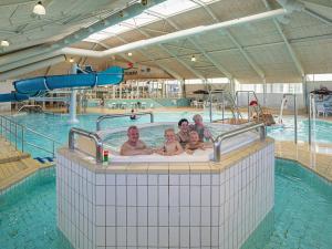 8 person holiday home on a holiday park in Løkken