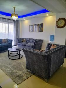 The comfort executive loft three bedroom apartment with amazing breathtaking city views , swimming pool ,gym ,private ample parking space with designated child playground area
