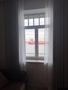Charming Smiltyne Kurhaus apartment with a view to lagoon