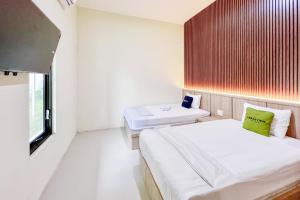 Urbanview Hotel MD Residence