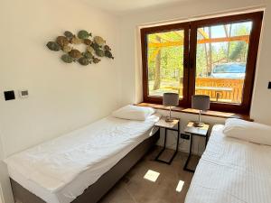 ForestLake Długie - Apartamenty nad jeziorem