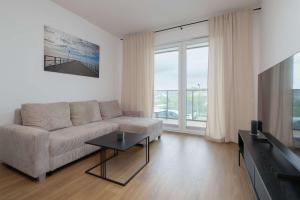 Family Apartment in Gdynia with Parking and Playground by Noclegi Renters
