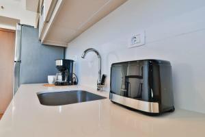 Stylish Retreat Steps from Shopping del Sol