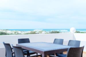 Beach House , Sea and Golf views E4