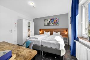 JUNIPRO Apartments & Rooms