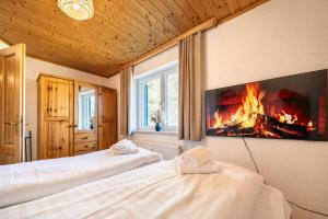 Berglodge Hochrindl - Panoramasauna, Eigengarten, Skipiste & Wandern