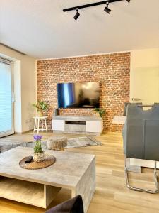 Gemütliche Ferienwohnung Oldenburg City mit Terrasse und Wohnzimmer im Erdgeschoss N28L