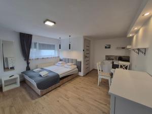 Noclegi Piaskowa 44
