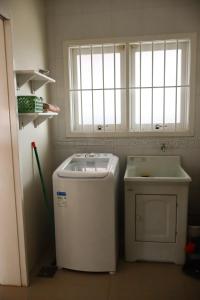 Casa completa com piscina a 1 quadra do mar em torres