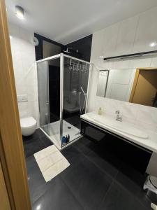 Komfortowy apartament z siłownią i sauną Revisit Apartment 11