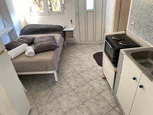 Poseidon Street ΝΕΑ ΜΕΣΑΓΓΑΛΑ Γκαρσονιέρα 3