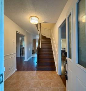 Spacious Home with Movie Lounge, close to GO Train to DT