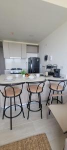 Exclusivo apartasuite con terraza y vista al mar - Bello Horizonte