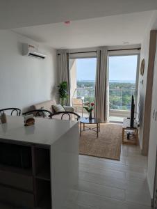 Exclusivo apartasuite con terraza y vista al mar - Bello Horizonte