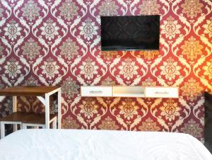Urbanview Hotel at Suncity Residence Apartemen Sidoarjo