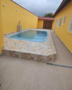 Casa com Piscina aquecida em Mongaguá