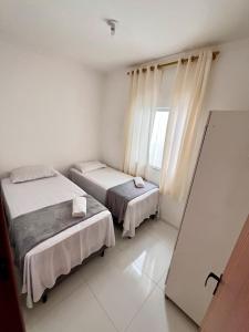Casa Aconchegante 3-4 quartos com ar condicionado e garagem