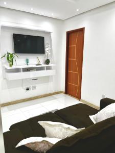 Casa Aconchegante 3-4 quartos com ar condicionado e garagem