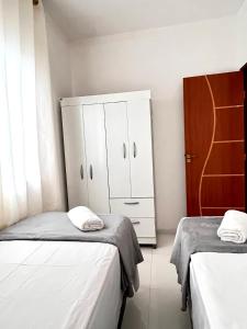 Casa Aconchegante 3-4 quartos com ar condicionado e garagem