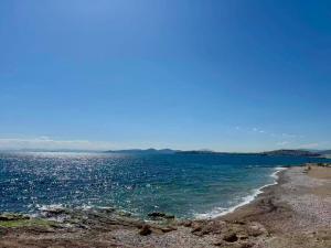 Azure Breeze Seafront 2BR 2 Bathrooms Steps to Beach