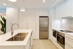 Sunny Swim-out Serenity with Direct Beach Access