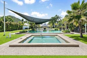 Trinity Beach Bliss - Experience Tropical Living