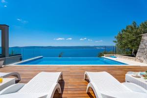 Luxurious beachfront villa Hrid with with Jacuzzi, infinity pool