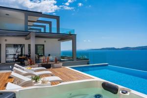 Luxurious beachfront villa Hrid with with Jacuzzi, infinity pool