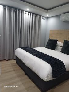 Uptown Apartments - Casalinga Villas