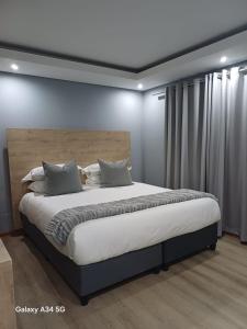 Uptown Apartments - Casalinga Villas