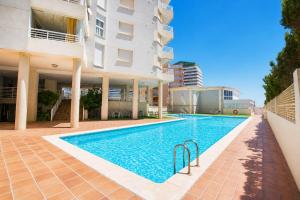 Apartment on the beach with parking and pool