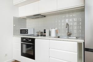 Stylish Studios with Parking near Spodek Arena by Noclegi Renters