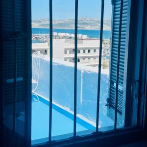Traditional 2 bedroom apartment with a private terrace offering a 180 degree view of Tangiers signatures