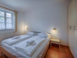 Feriendorf Rugana - Klassik Appartement mit 1 Schlafzimmer und Terrasse A24