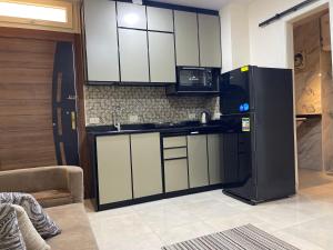 Tiba golden chalet with pool view steps from sea