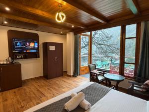 Hotel The Blueberry With Swimming Pool - By Aasia Holidays