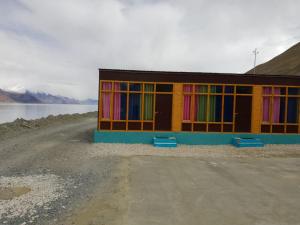 snow land wooden cottage