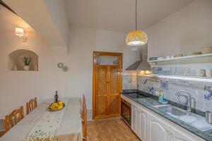 Casa con Drago Milenario