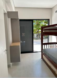 Casa Nova e Moderna a 1 Min da Praia da Lagoinha